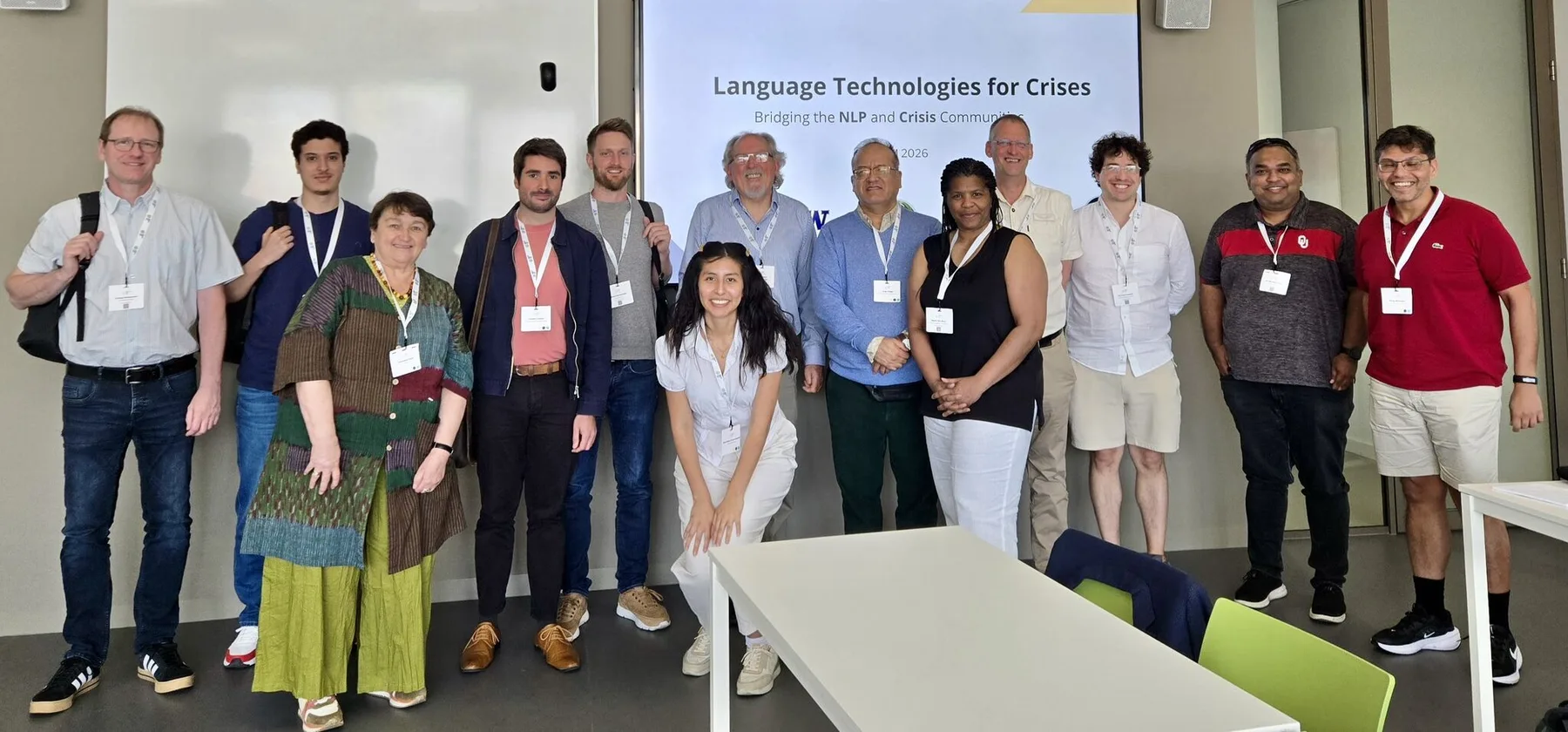 Participants standing together at the Voices Across Crises workshop during ISCRAM 2026
